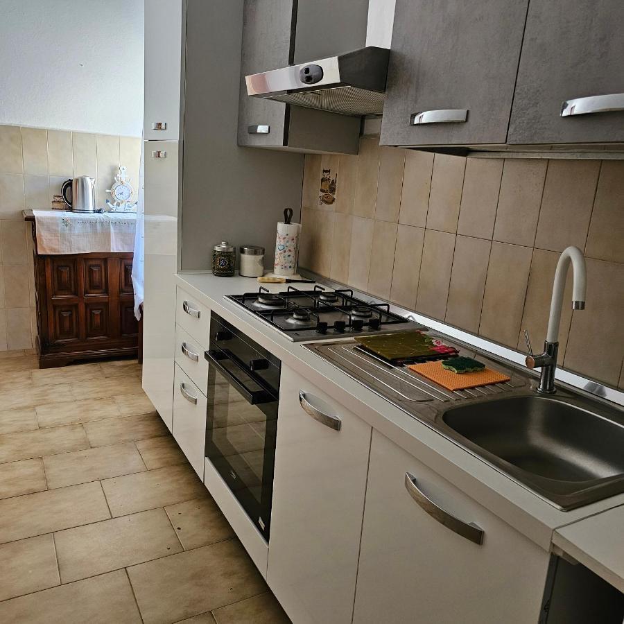 Appartamento A Telti Con Giardino Privato E Posto Auto Екстер'єр фото